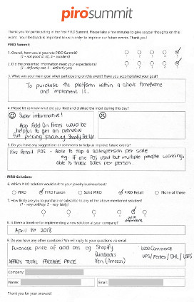 Photo of completed PIRO Summit evaluation form with handwritten attendee comments